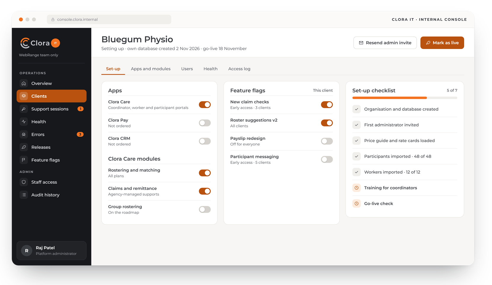 Clora IT console: a new client being set up, with its apps and modules, feature flags and a set-up checklist